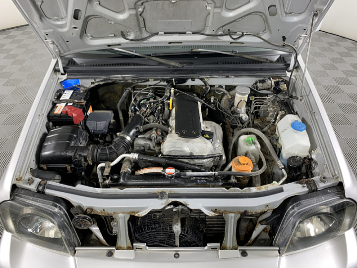 SUZUKI Jimny 1.3, 2006 года, Автоматическая, Серебристый