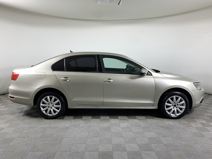 VOLKSWAGEN Jetta 1.6, 2012 года, Механика, Серебристо-желтый