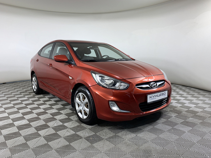 HYUNDAI Solaris 1.4, 2013 года, Автоматическая, Красный гранат