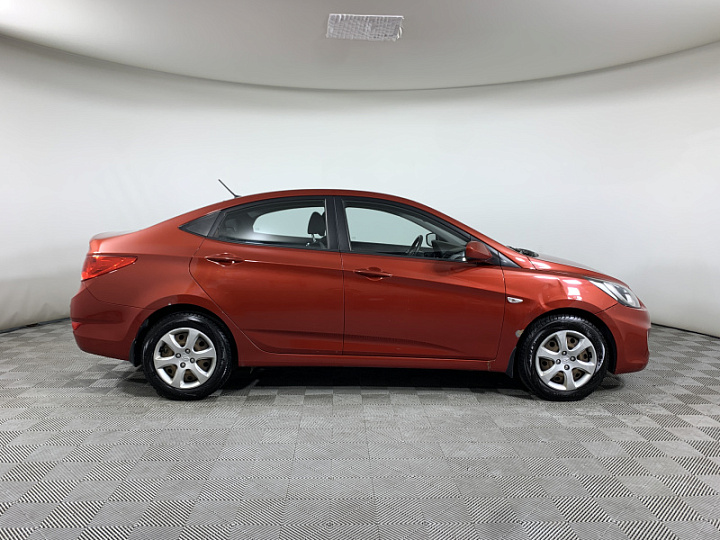 HYUNDAI Solaris 1.4, 2013 года, Автоматическая, Красный гранат