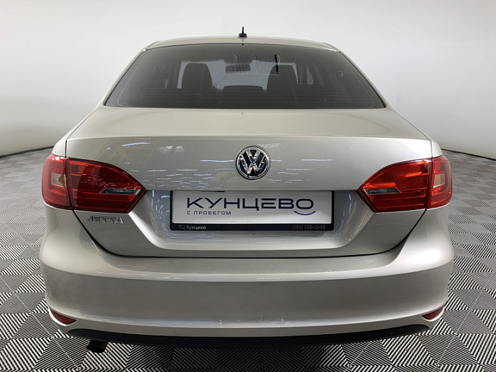 Volkswagen Jetta 1.6, 2012 года, Механика, Серебристо-желтый