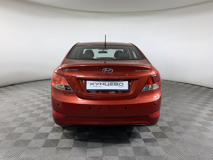 HYUNDAI Solaris 1.4, 2013 года, Автоматическая, Красный гранат