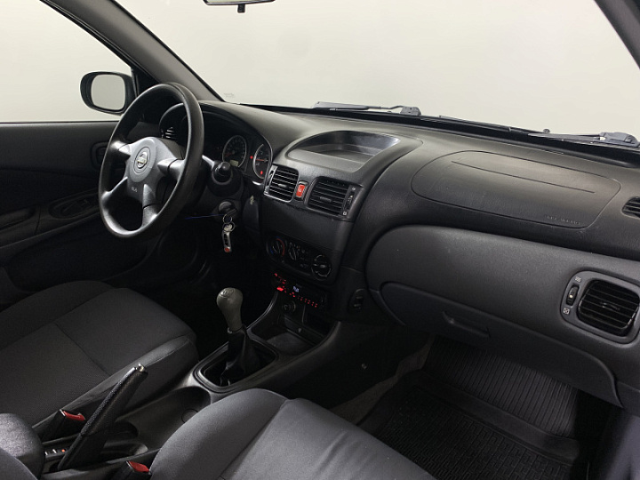 Nissan Almera 1.5, 2005 года, Механика, Черный