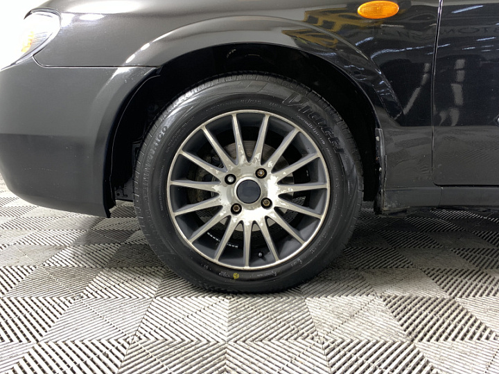 Nissan Almera 1.5, 2005 года, Механика, Черный