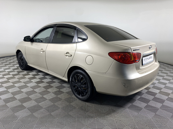 Hyundai Elantra 1.6, 2010 года, Автоматическая, Желтый