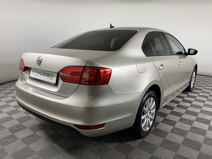 VOLKSWAGEN Jetta 1.6, 2012 года, Механика, Серебристо-желтый