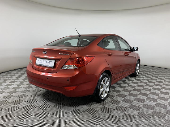 HYUNDAI Solaris 1.4, 2013 года, Автоматическая, Красный гранат