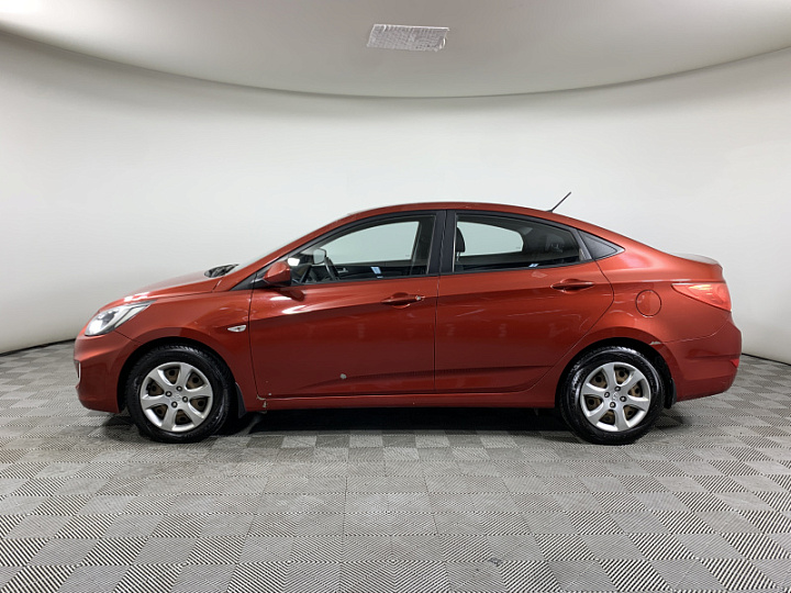 HYUNDAI Solaris 1.4, 2013 года, Автоматическая, Красный гранат