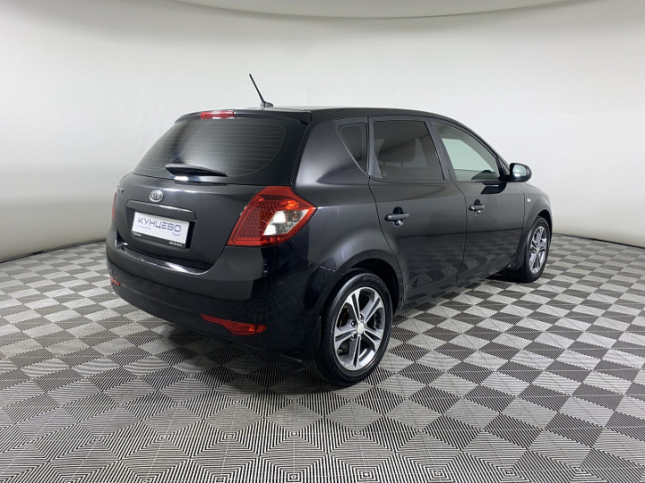 KIA Ceed 1.4, 2011 года, Механика, Черный перламутр
