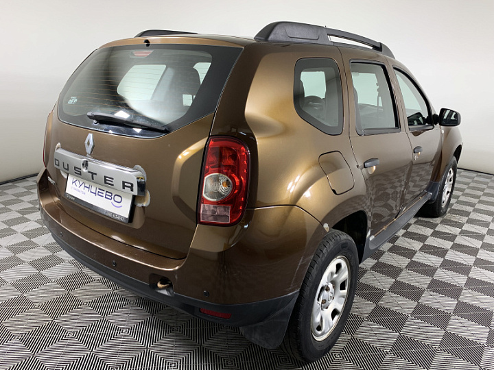 Renault Duster 1.6, 2013 года, Механика, Коричневый